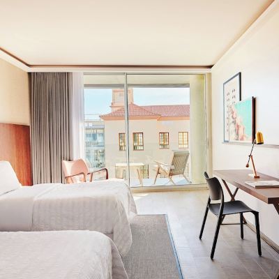 Deluxe Contemporary 2 Twin Guest room with Partial sea view and Balcony Le Meridien Ra Beach Hotel and Spa Promo Code