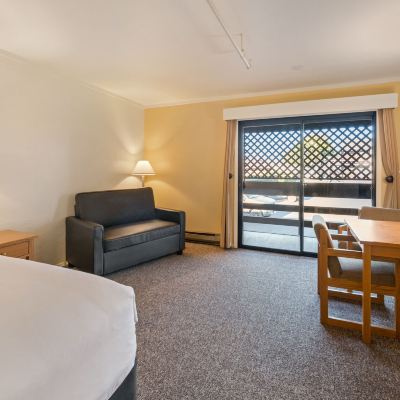 Guest Room with 1 King Bed and Balcony (No View) (Upstairs) Harbor Lite Lodge Promo Code