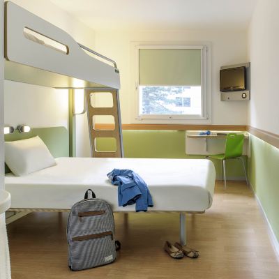 Triple Room With A Large Bed And A Bunk Bed