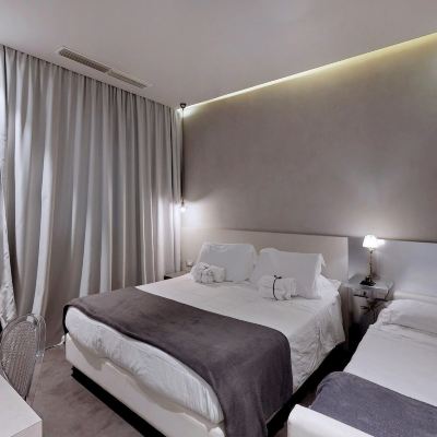 Design Triple Room Bell Suite Hotel Promo Code
