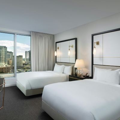Deluxe Room with Two Queen Beds The Laura Hotel, Houston Downtown, Autograph Collection Promo Code