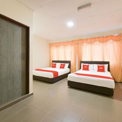 Suite Keluarga Kupon Gest Inn Hotel