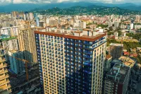 Komunna Luxe Hotel a 