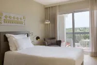 Ozadi Tavira Hotel