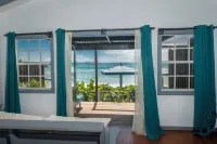 Conch Beach Cabins - Rumbus Beach Hotel di 