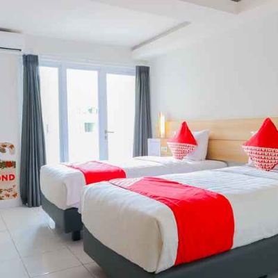 Deluxe Twin Room OYO Flagship 210 Amethyst Kemayoran Promo Code