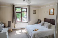 Toothbrush Rooms at Lattice Lodge - Guest Kitchen & EV Recharging