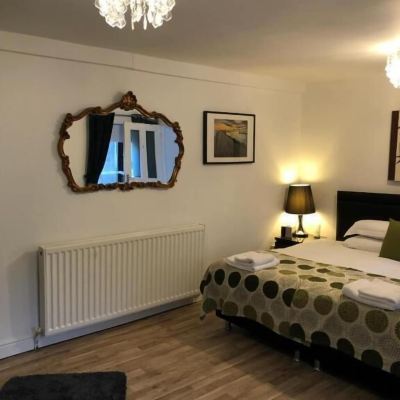 Twin Room with Shared Bathroom Trinity Guest House Promo Code