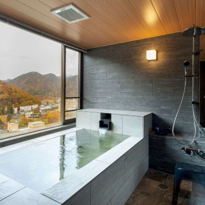 シーニックビューの温泉風呂付き西洋風部屋 定山渓万世閣 ホテルミリオーネ クーポン
