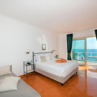 Deluxe Quadruple Room with Balcony and Sea View