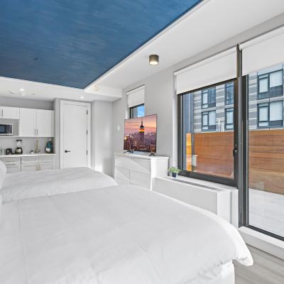 Deluxe Double Room, 2 Queen Beds, Balcony Global Luxury Suites at The Arches Promo Code