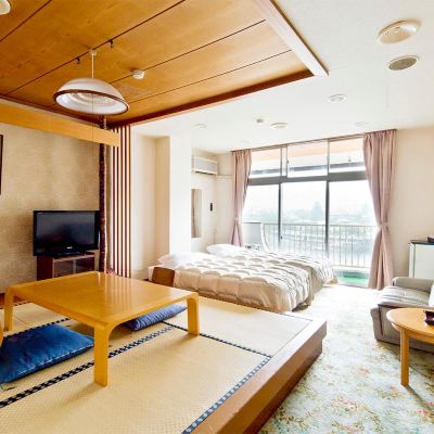 和洋式レイクビュールーム 大自然の静寂と天然自噴温泉を愉しむ湯宿　亀山温泉ホテル クーポン