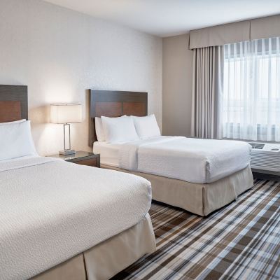 One-Bedroom Suite With Two Queen Beds-Sofa Bed Days Inn & Suites by Wyndham Airdrie Promo Code