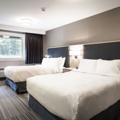 Two Queen Deluxe Suite with Fireplace (Not Pet Friendly) Mountaineer Lodge Promo Code