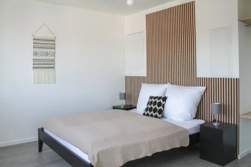 Close to the city center, with balcony, parking space and charging station