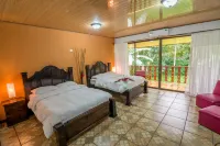 Ara Ambigua Lodge Отели в г. 