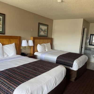 Deluxe Room-2 Queen Beds Skyway Inn - Seatac Promo Code