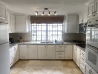 Roomy Lower 3 Bedroom West Coast Property with Pool