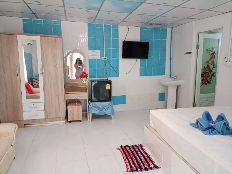 ห้องฮันนีมูนสวีท เตียงควีนไซส์ 1 เตียง วิวรีสอร์ท พื้นที่สนามหญ้า