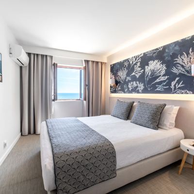Family Room With Balcony And Sea View Castelo Guest House Promo Code