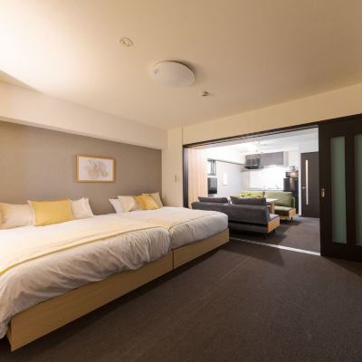 ダブルベッド2台のDXツインルーム タクトステイ堺筋本町 クーポン