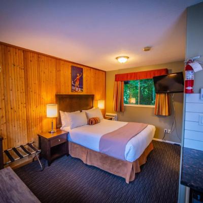 Kitchenette with One Queen Size Bed Alpine Inn & Suites Promo Code