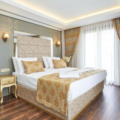 Bed In Deluxe Double Room With Balcony And Sea View Sultan Suleyman Palace Spa Promo Code
