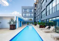 Instyle Residences at Rizz Suites Отели в г. 