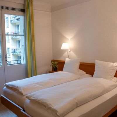 Triple Room with Private Bathroom Hotel Marthahaus Promo Code