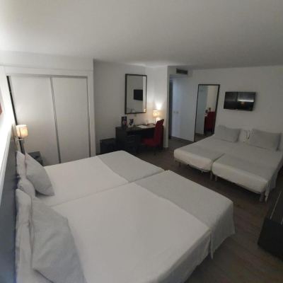 Quadruple Room with Balcony Hotel Los Álamos Promo Code