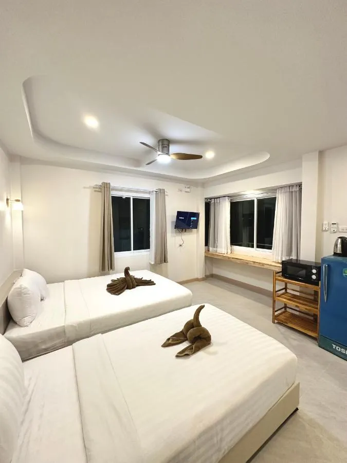 ห้องพักสำหรับสามท่านพร้อมระเบียง