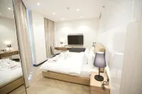 皇家曼蘇拉公寓酒店