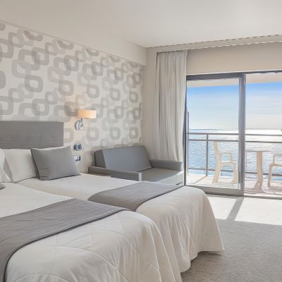 Double or Twin Room with Balcony (2 Adults + 1 Child) -Sea View