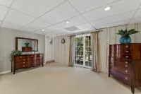 3 bedroom/2 full bath lakefront home with gentle slope to private covered dock