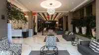 De Lobby Suite Hotel