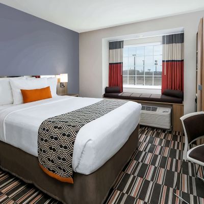 Queen Room With Two Queen Beds And Roll-in Shower-Mobility/Hearing Accessible-Non-Smoking Microtel Inn and Suites by Wyndham Monahans Promo Code