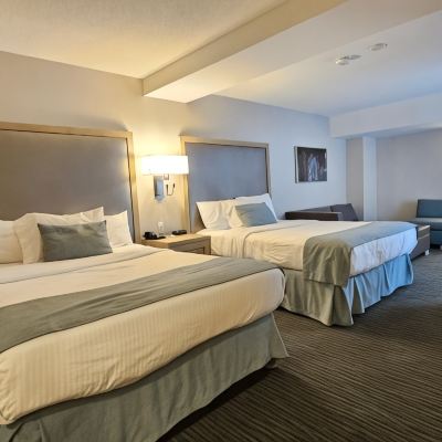 Studio Guest Room, 2 Queen Beds & Sofa Bed Vittoria Hotel & Suites Promo Code