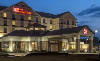"a hotel with a large sign that says "" hampton inn "" prominently displayed on the front" at Hilton Garden Inn Uniontown