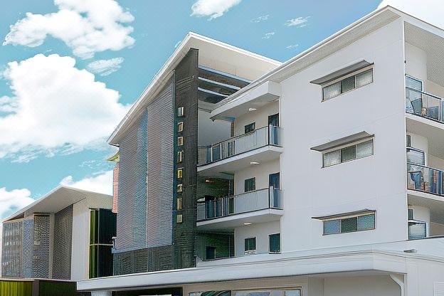 "a modern , multi - story building with a sign that says "" hrbtbital "" and balcony railings , set against a cloudy blue" at Monterey Apartments Moranbah