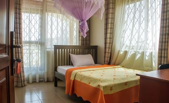 Tropical Suites Hotel - Housity