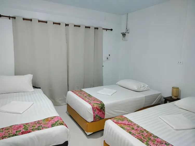 ห้องพักสำหรับสามท่านพร้อมระเบียง