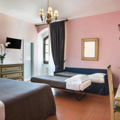 Quadruple Room Hotel La Cisterna Promo Code