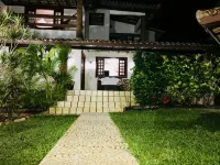 Cozy and Charming House with Pool and Gardens in a Beachfront Condominium!