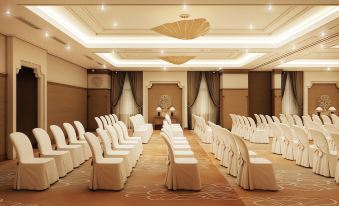 a large conference room set up for a meeting , with rows of chairs arranged in a semicircle at Ninh Binh Hidden Charm Hotel & Resort