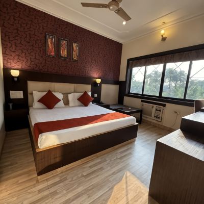 Deluxe Room With Garden View Palm Village Resort Promo Code