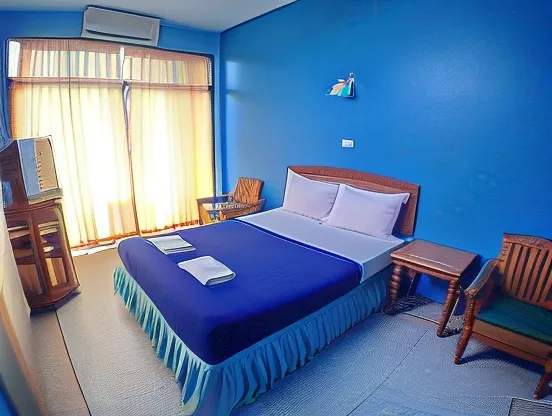ห้องมาตรฐานเตียงใหญ่พร้อมเครื่องปรับอากาศ