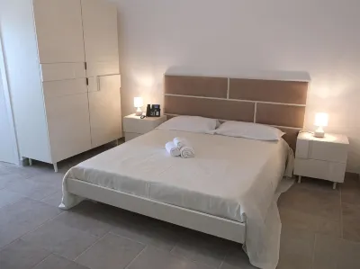 L'Amarena Garden House Отели в г. 