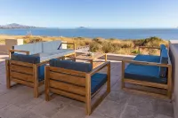 Large Luxury Beachfront Villa with Pool, Paddleboards, Golf Carts- Family Ready!