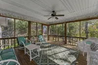 3 bedroom/2 full bath lakefront home with gentle slope to private covered dock