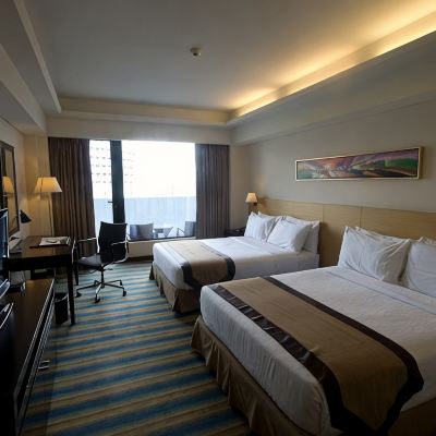 Deluxe Two Queen Beds Room Luxent Hotel Promo Code